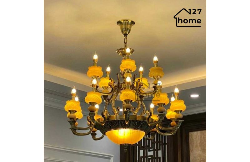 Sắc đồng ấm kết hợp đá tự nhiên, tạo điểm nhấn tinh tế cho không gian.