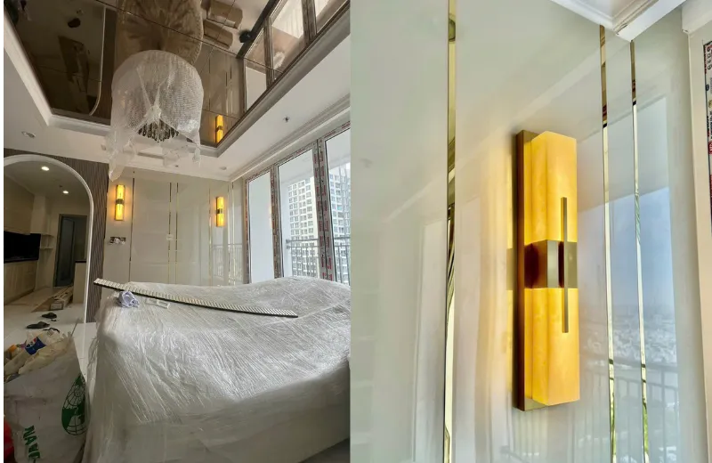 Đèn tường VD8003 thân đồng kết hợp đá cao cấp – ánh sáng LED 3000K dịu nhẹ, tạo điểm nhấn sang trọng cho không gian phòng khách hiện đại.